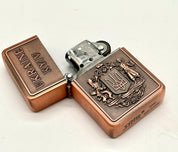 Ukrainian gasoline lighter with bronze and silver national coat of arms, collectible item.