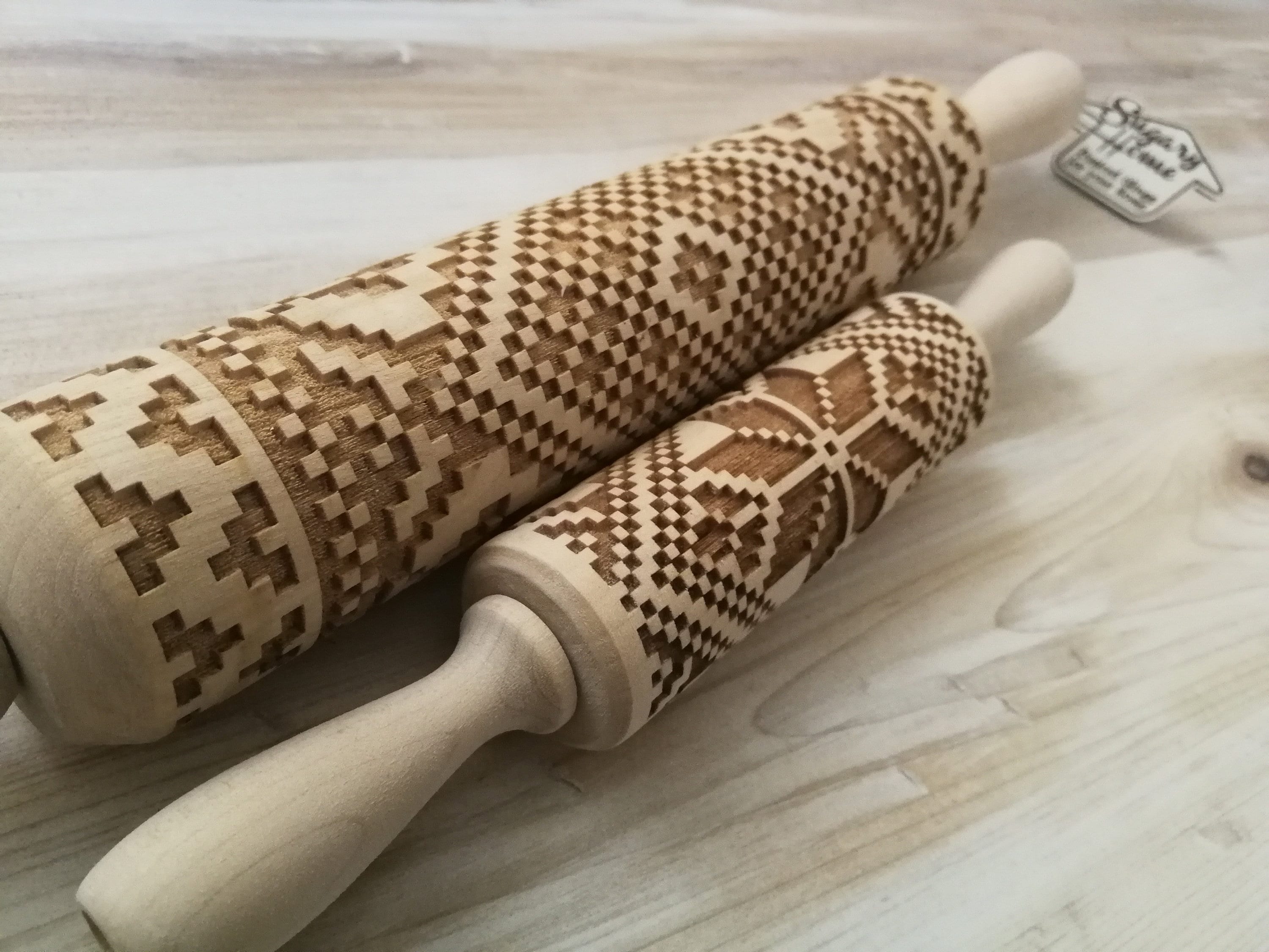 Handmade wooden rolling pins with Ukrainian folk patterns, laser engraved for baking, eco-friendly beech wood, unique gift.
