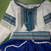 Ukrainian Hutsul folk costume for girls in blue, featuring woven designs and lace. Includes blouse, skirt, and belt.