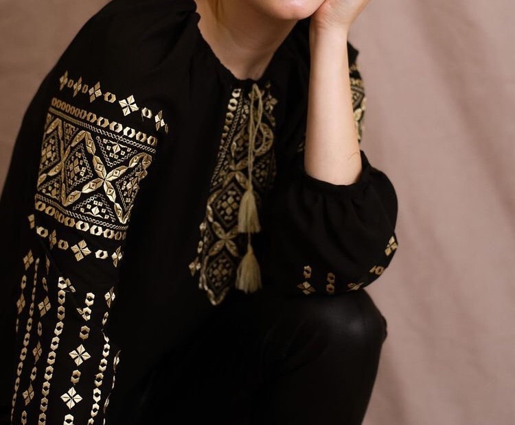Handmade embroidered blouse with intricate Ukrainian Vyshyvanka patterns in boho style, perfect elegant gift for women.