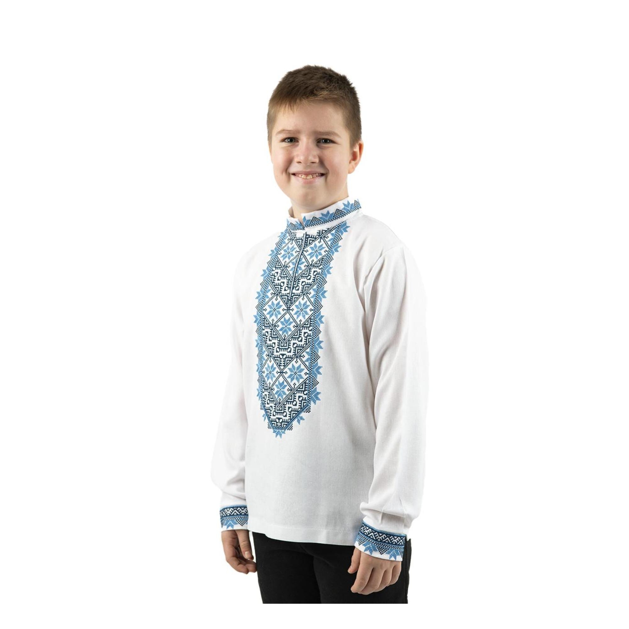 Boy wearing a Ukrainian white linen shirt with blue embroidery, ideal for cultural events and casual wear, ages 5–16.