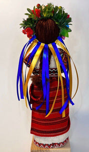 Handmade Ukrainian Motanka Doll "Invincible" with vibrant ribbons, adorned with floral crown, symbolizing peace and strength.