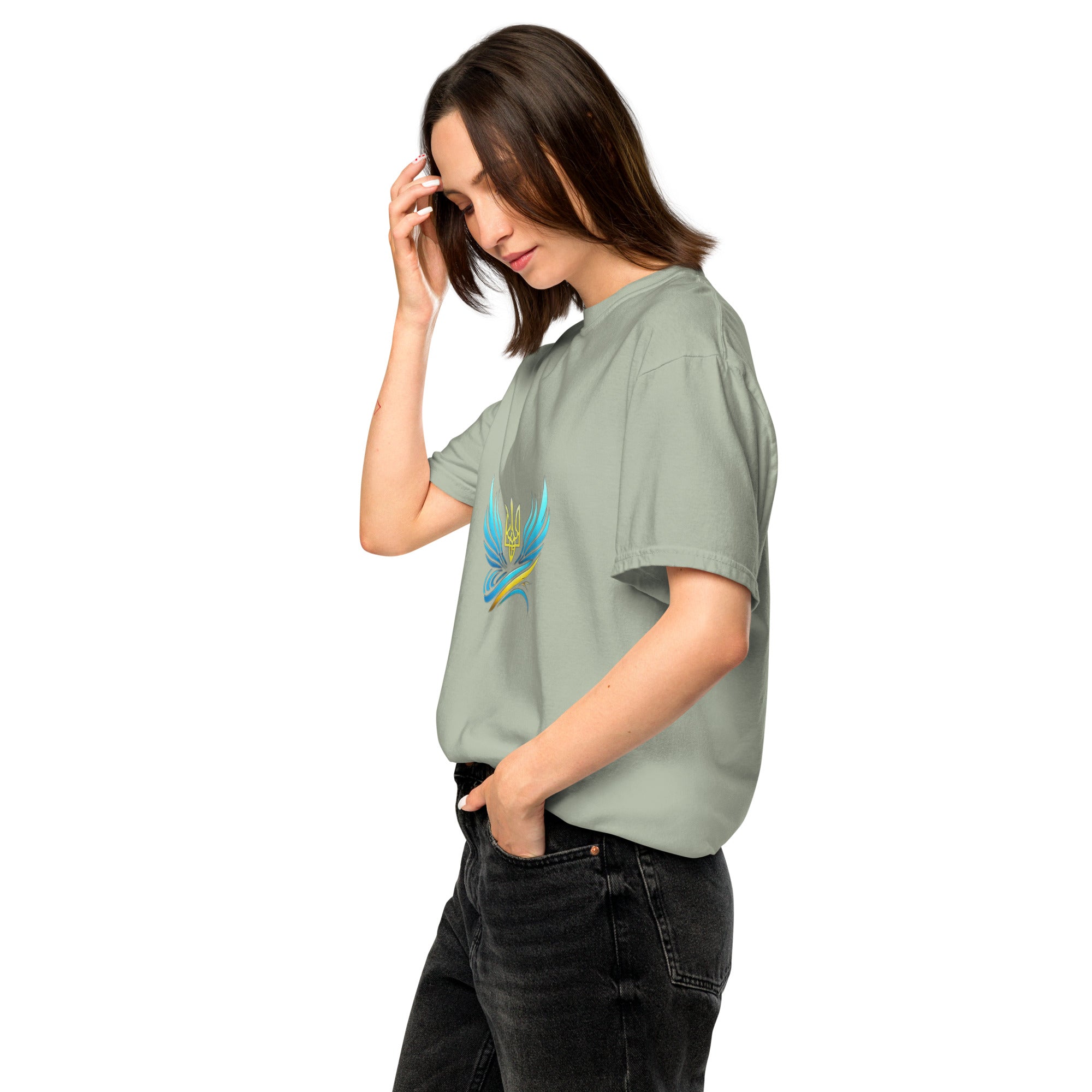Woman wearing Ukrainian Vibe Trizub Collection heavy t-shirt, side view, highlighting soft, breathable 100% cotton material.