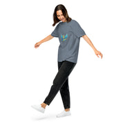 Woman wearing Ukrainian Vibe Trizub Collection heavyweight t-shirt, relaxed fit, made of 100% ring-spun cotton. Casual style.