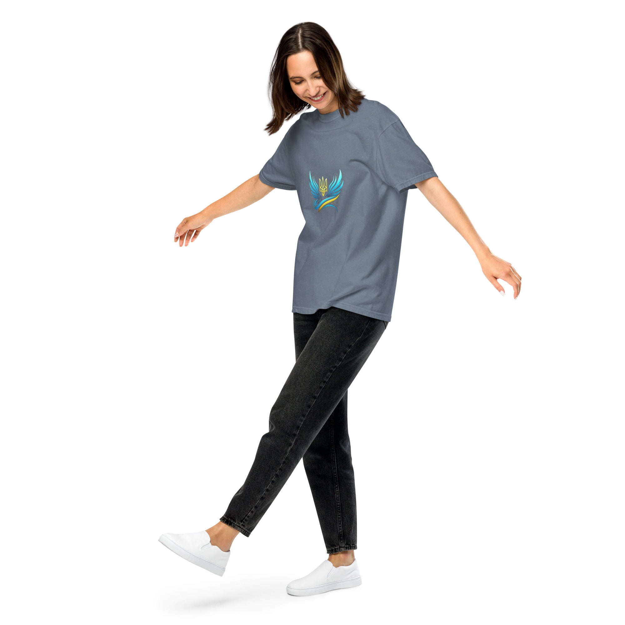 Woman wearing Ukrainian Vibe Trizub Collection heavyweight t-shirt, relaxed fit, made of 100% ring-spun cotton. Casual style.