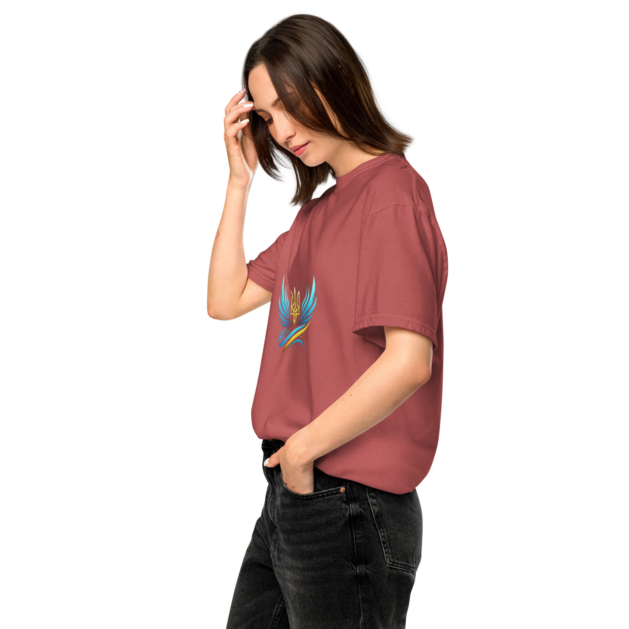 Woman wearing Ukrainian Vibe Trizub Collection garment-dyed heavyweight t-shirt with trident design, relaxed fit style.