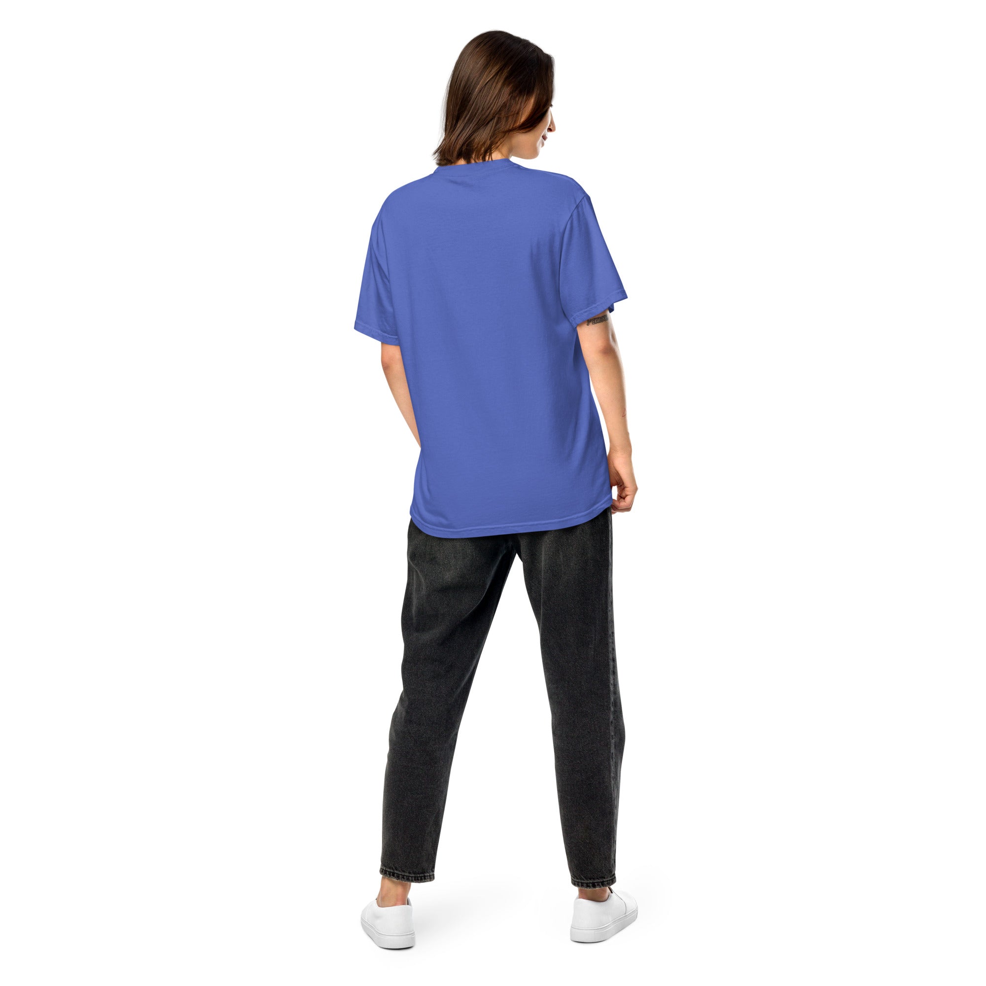 Woman wearing Ukrainian Vibe Trizub heavy cotton t-shirt, back view, showcasing garment-dyed finish and relaxed fit in blue.