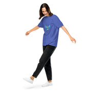Woman wearing Ukrainian Vibe Trizub Collection blue heavyweight t-shirt, displaying relaxed fit and unique garment-dyed finish.