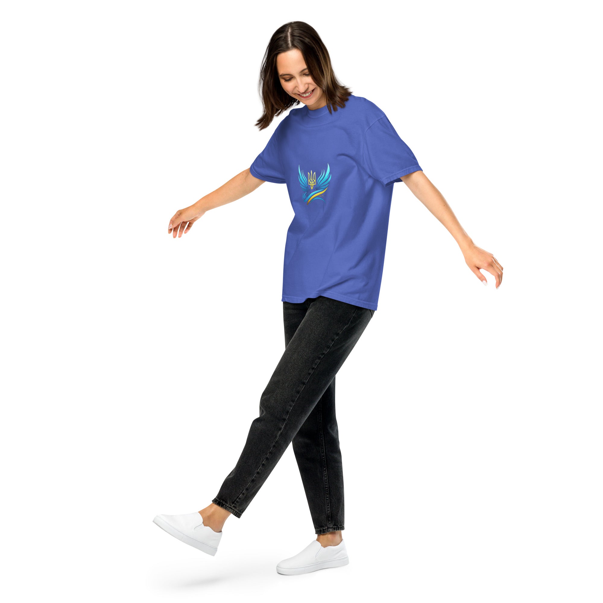 Woman wearing Ukrainian Vibe Trizub Collection blue heavyweight t-shirt, displaying relaxed fit and unique garment-dyed finish.