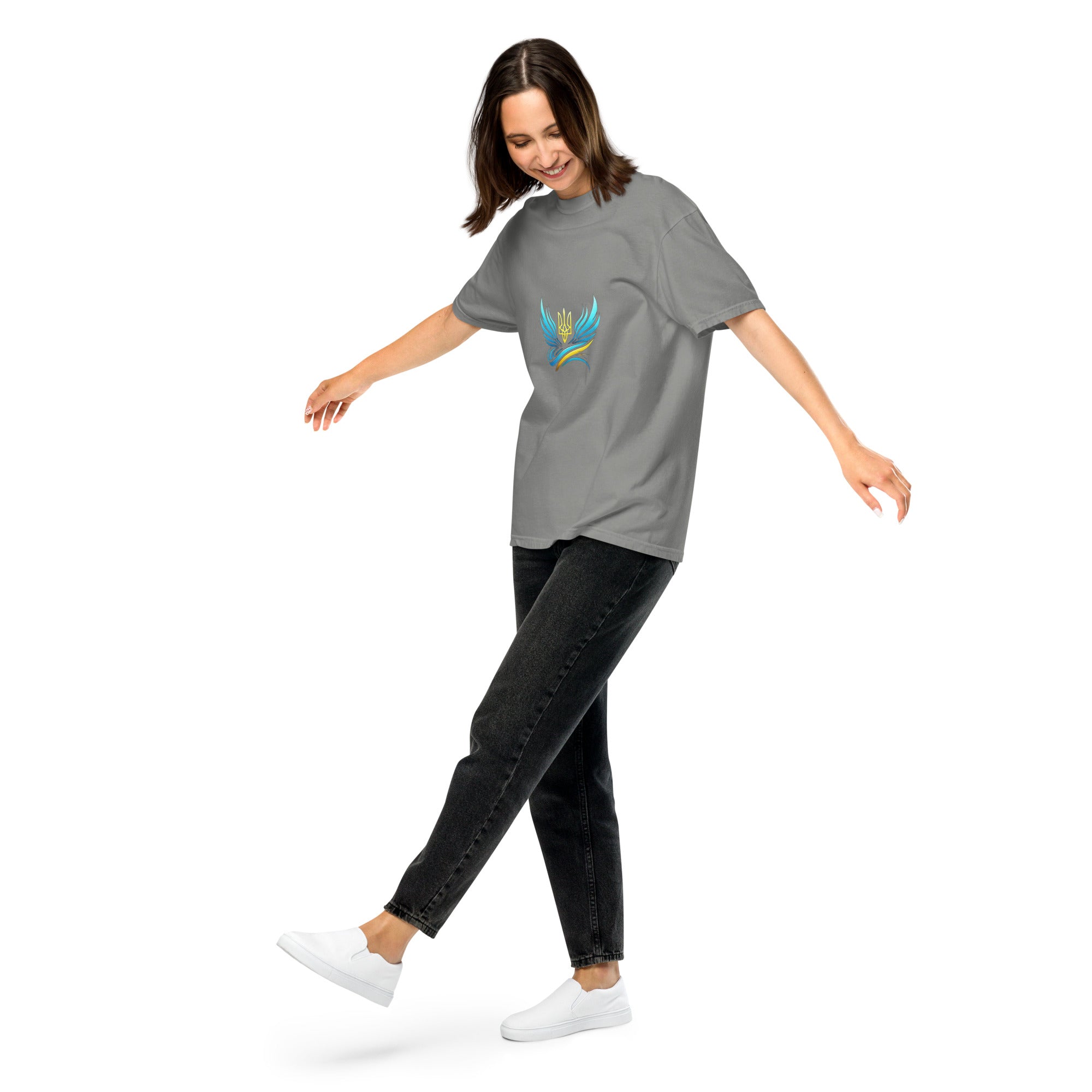 Woman wearing Ukrainian Vibe Trizub Collection garment-dyed heavyweight t-shirt with Trizub emblem, casual style, grey tone