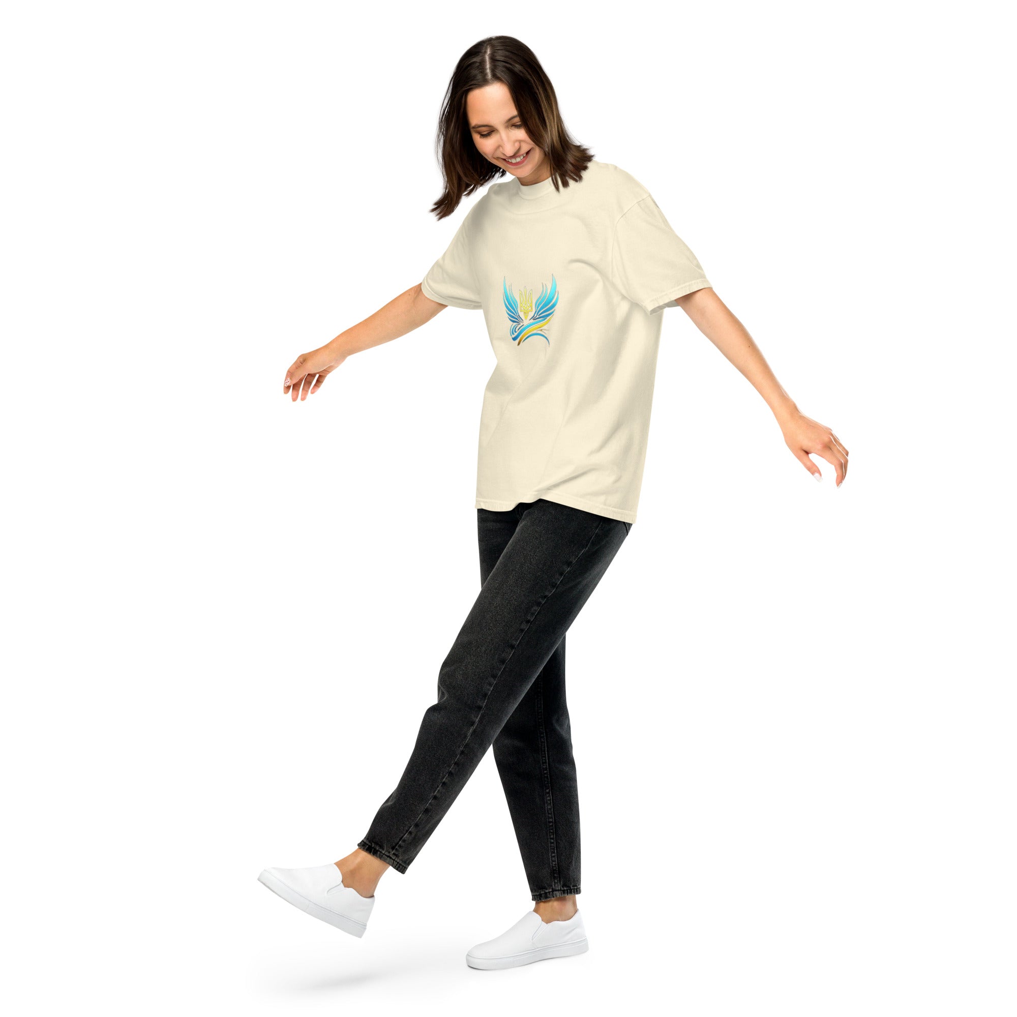 Woman wearing Ukrainian Vibe Trizub Collection t-shirt with bright Trizub logo, showcasing a relaxed fit and comfortable style.