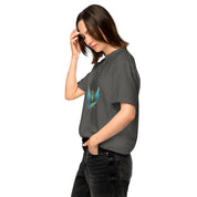 Woman wearing a Ukrainian Vibe Trizub Collection heavyweight t-shirt with Trizub design, shown in a relaxed fit and garment-dyed finish.