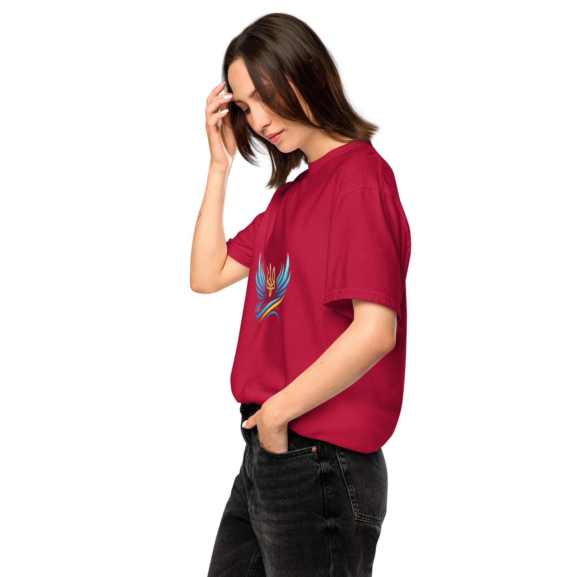 Model wearing Ukrainian Vibe Trizub Collection maroon women's heavyweight t-shirt with embroidered trizub design.
