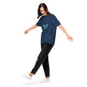 Woman wearing Ukrainian Vibe Trizub blue t-shirt and black jeans, displaying the garment's relaxed fit and design.