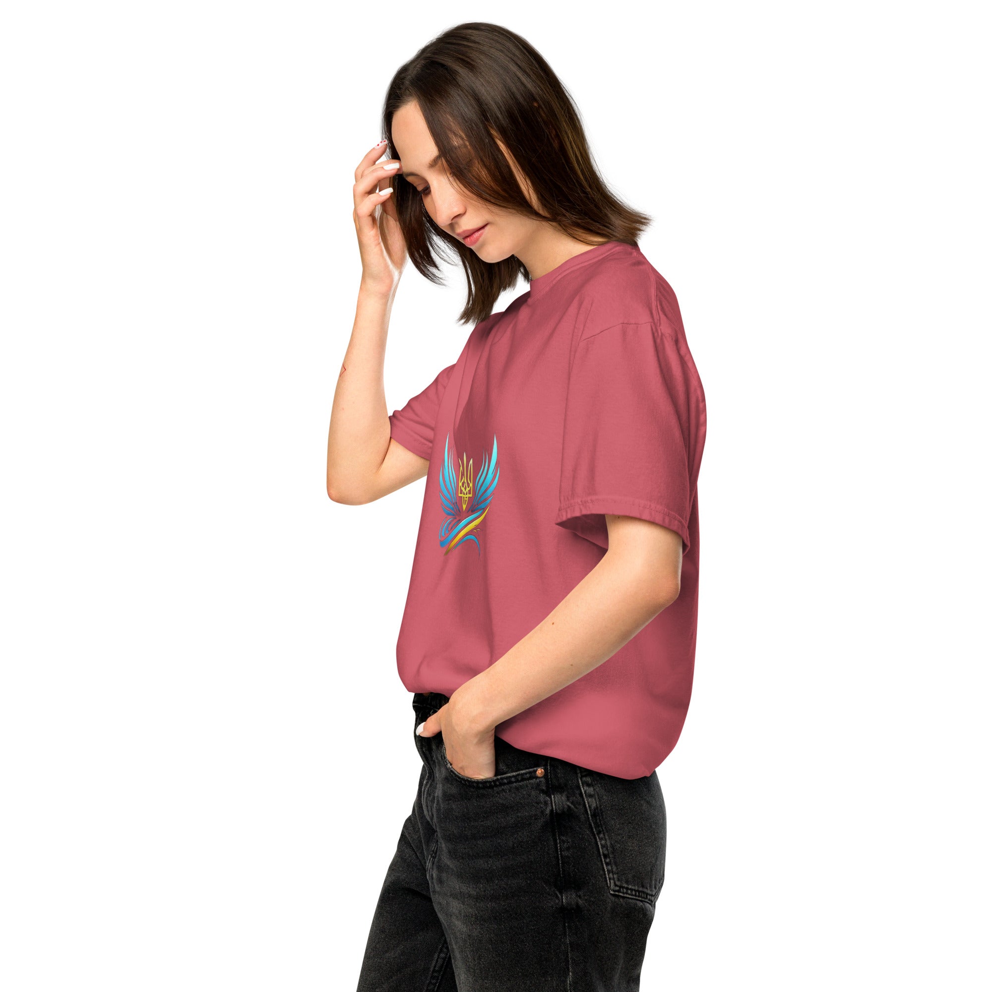 Woman wearing Ukrainian Vibe Trizub Collection heavyweight t-shirt in red, featuring a unique trident design, relaxed fit, ring-spun cotton.