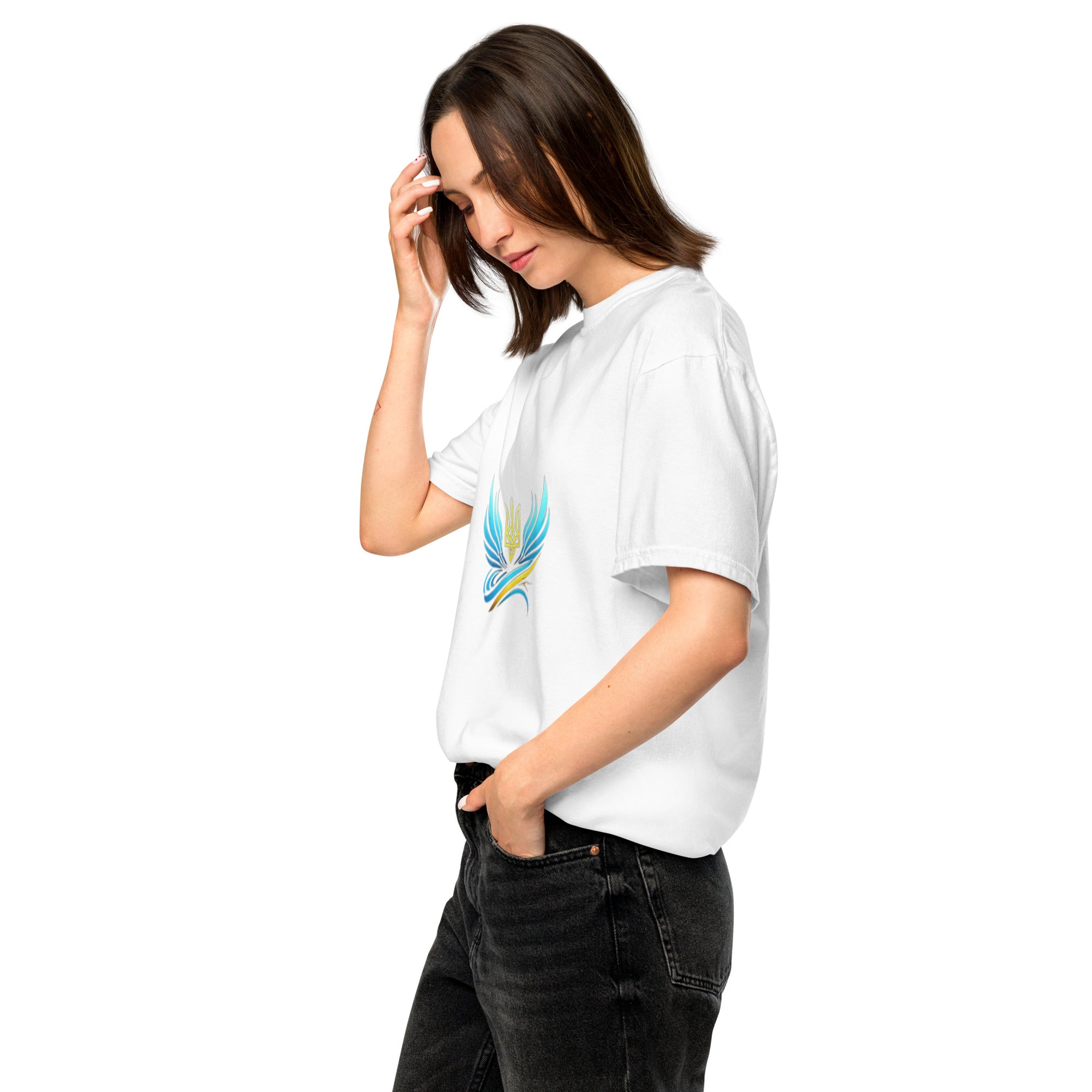 Woman wearing Ukrainian Vibe Trizub Collection heavyweight t-shirt with embroidered design, white tee, casual style and relaxed fit.