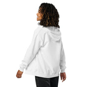 Woman wearing a white zip hoodie with Ukrainian Tryzub design, showing back view for warmth and style.