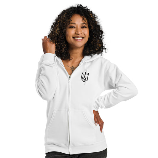 Woman wearing white Ukrainian Tryzub zip hoodie, soft fleece, cozy fit, showcasing Ukrainian pride and style.