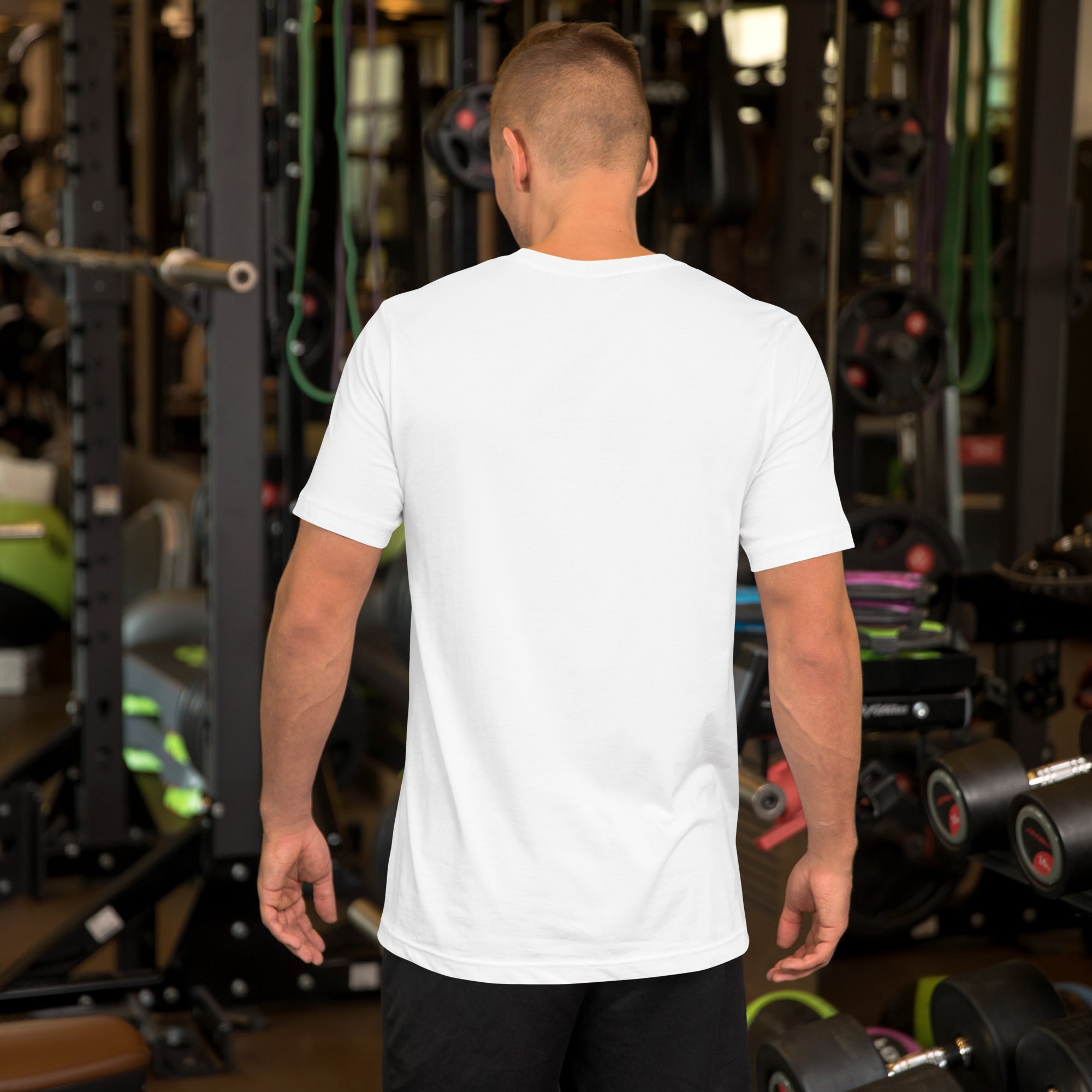 Man wearing white Stop Putin t-shirt in gym setting, back view
