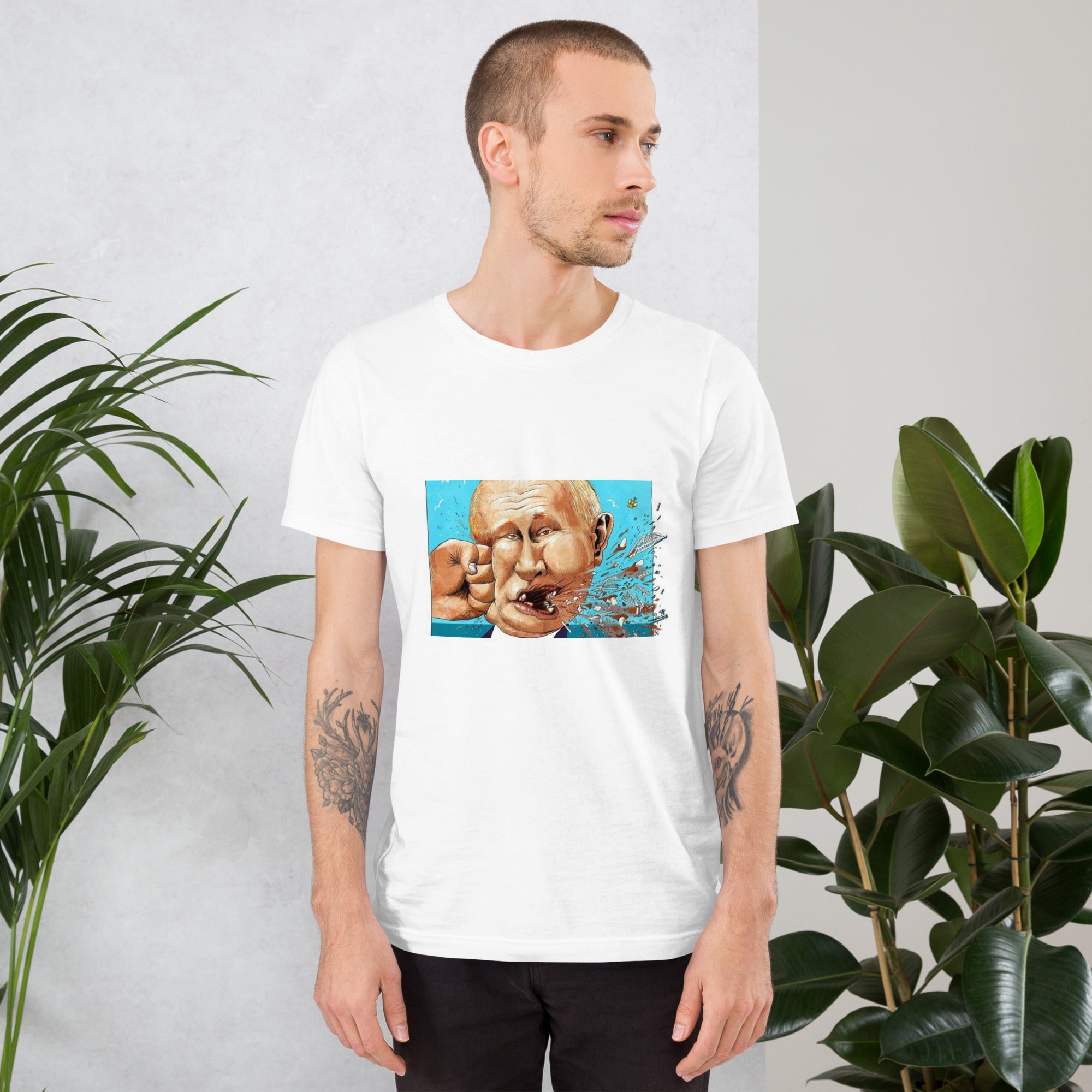 Man wearing white Stop Putin t-shirt with artistic graphic, illustrating a powerful statement against oppression.