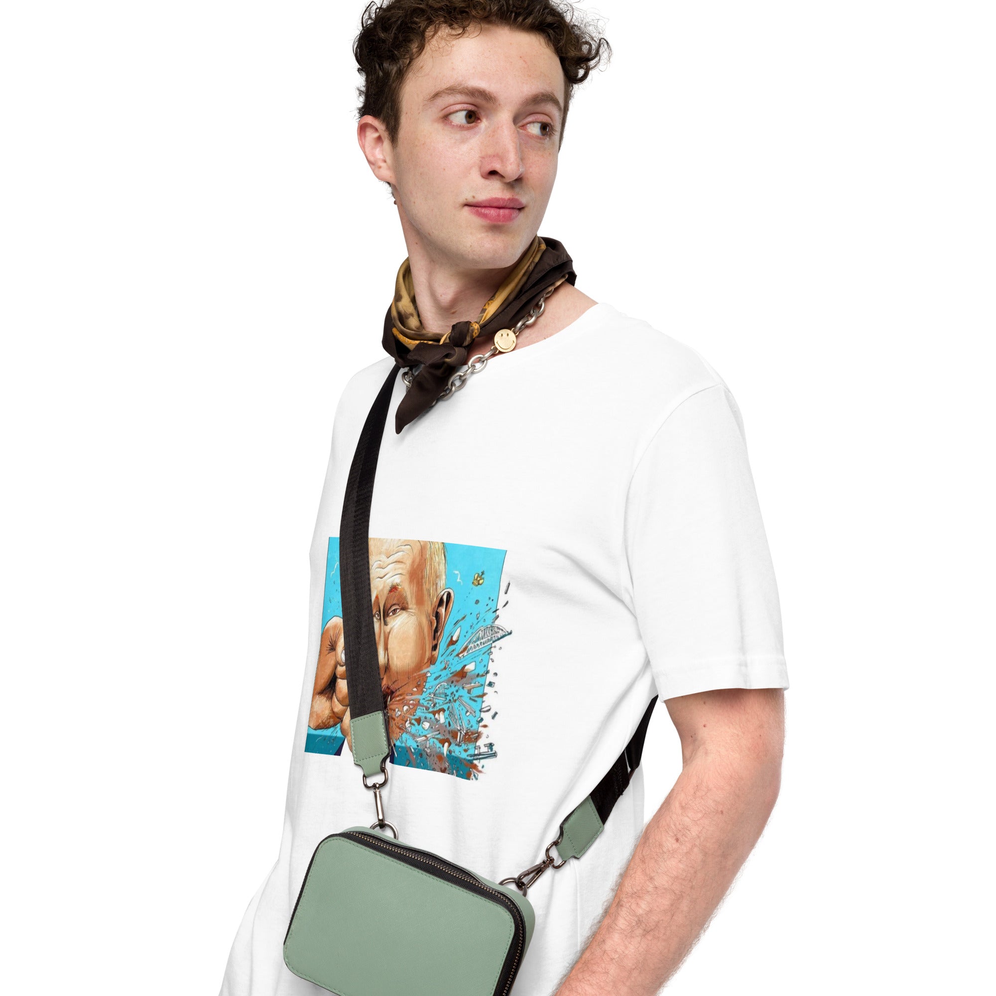 Man wearing "Stop Putin" T-shirt with graphic, styled with a scarf and green crossbody bag. Made of soft cotton for comfort and style.