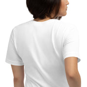 Woman wearing a white T-shirt in a side pose, showcasing the back design and soft cotton fabric for a comfortable fit.