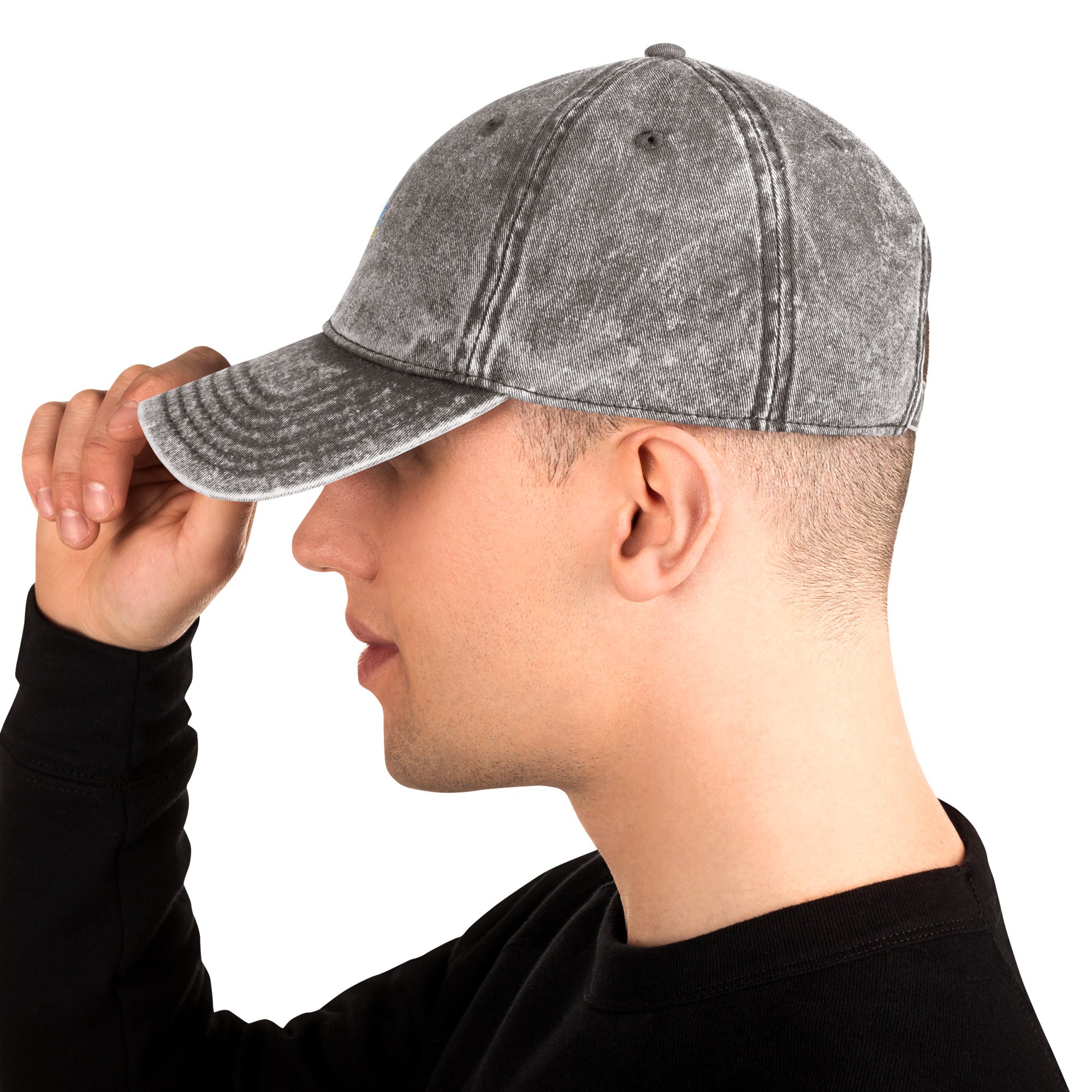 Vintage unisex cotton twill cap with embroidered Ukrainian Tryzub, showcasing washed-out effect and adjustable brass buckle.