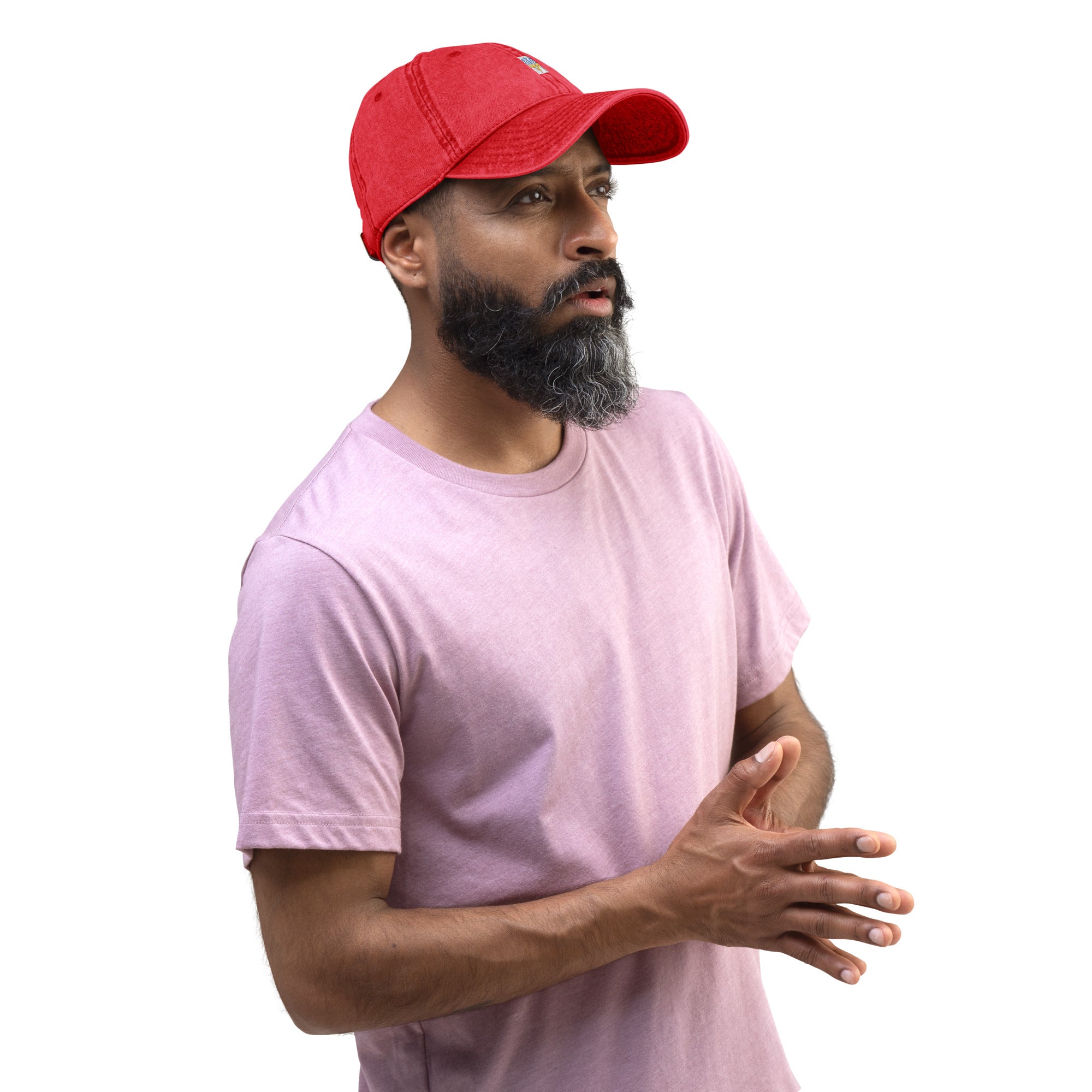Man wearing a red vintage cotton twill cap with embroidered Ukrainian Tryzub design, casual and stylish.