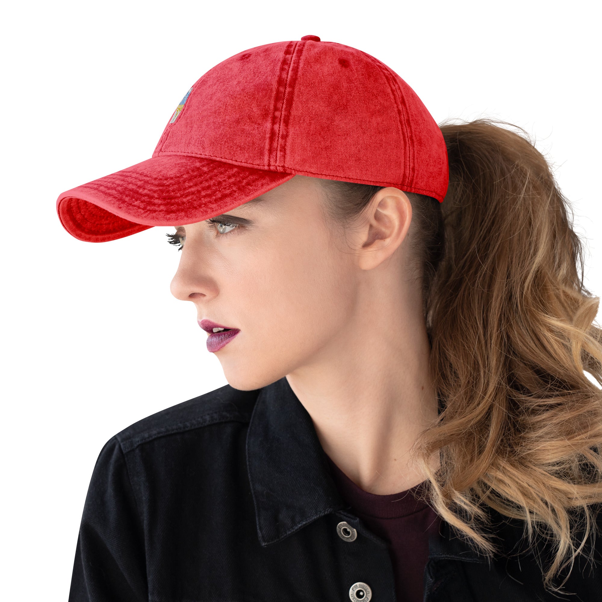 Woman wearing red vintage unisex cotton twill cap with embroidered Ukrainian Tryzub logo.