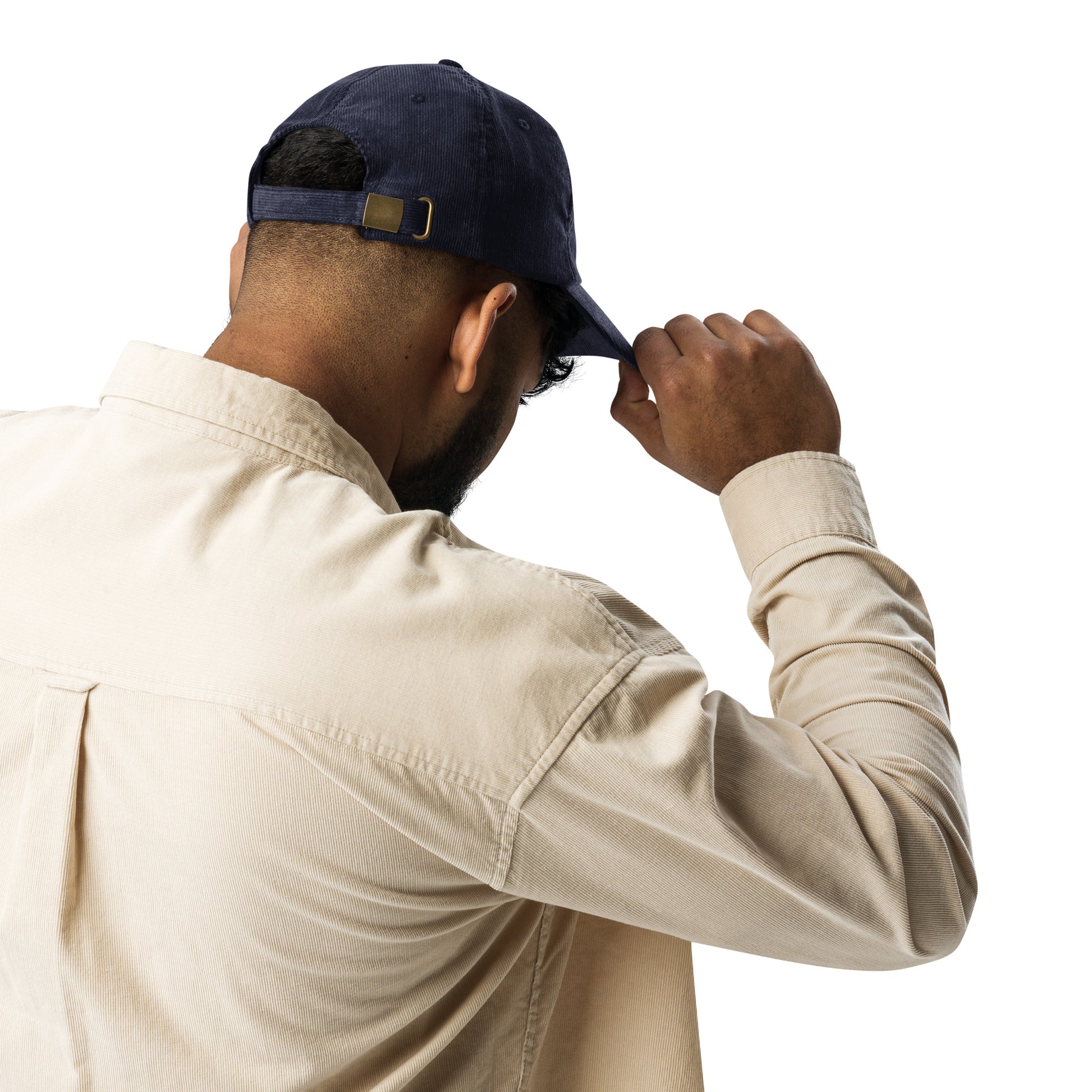 Man wearing a navy vintage corduroy cap with Ukrainian Tryzub emblem, showcasing adjustable fit and classic style.