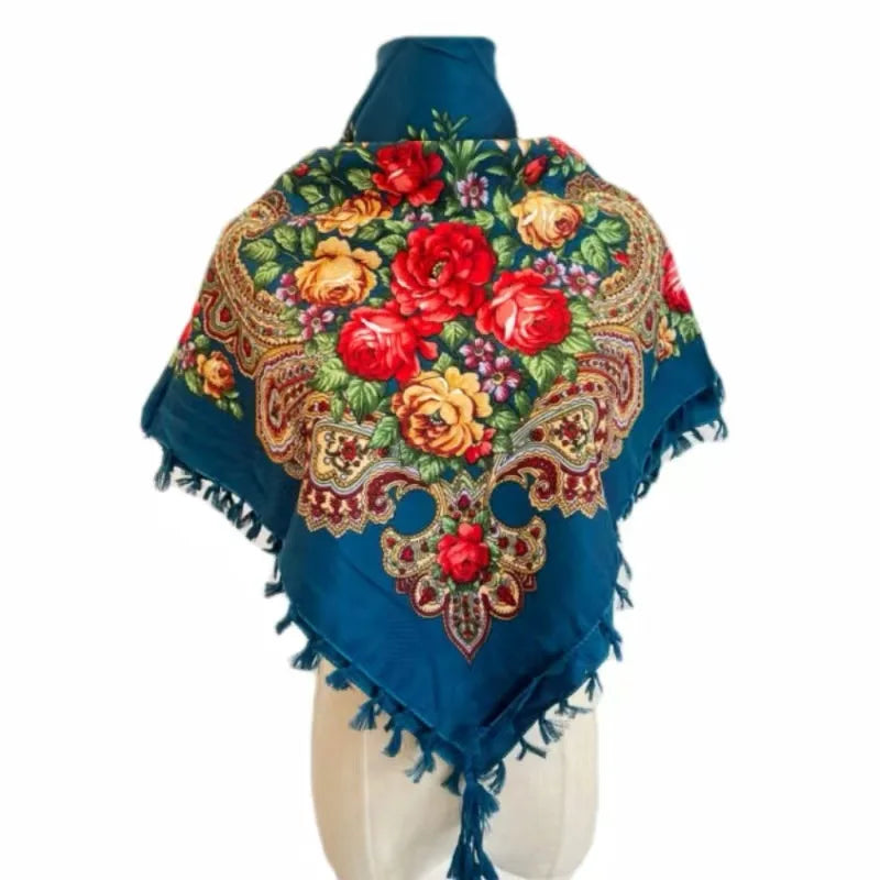 Vintage Ukrainian embroidered headscarf with floral design in vibrant colors on a blue cotton blend, showcasing cultural elegance.