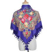 Vintage Ukrainian embroidered headscarf with floral design on a mannequin, featuring vibrant colors and traditional patterns.