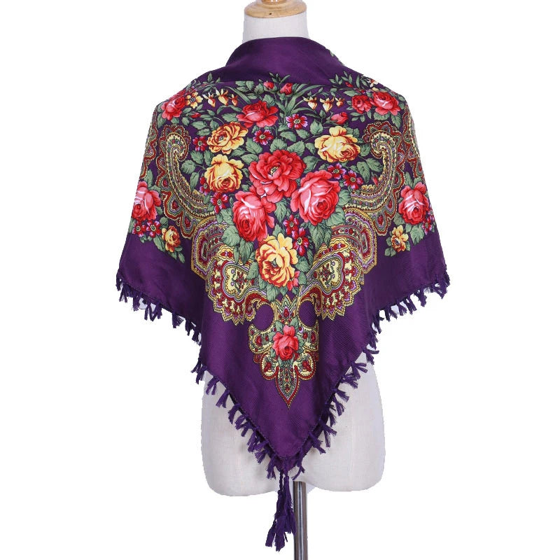 Vintage Ukrainian embroidered headscarf with floral design, featuring vibrant colors and traditional patterns on a mannequin.