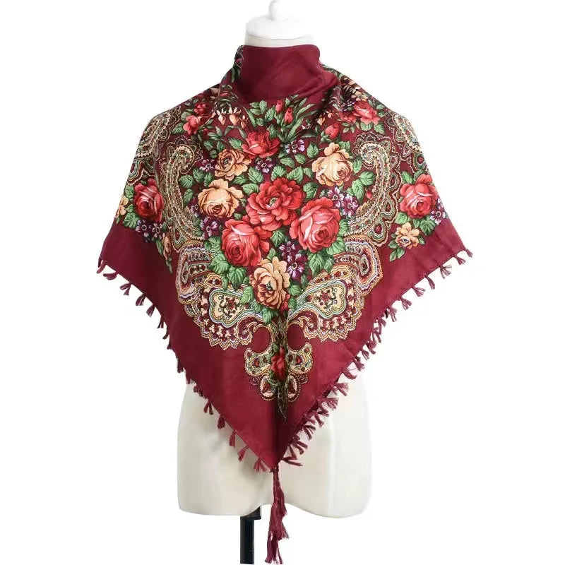 Vintage Ukrainian embroidered headscarf with floral design on mannequin.