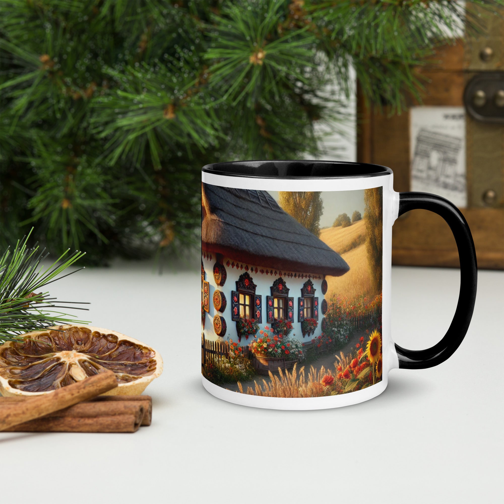 Ceramic mug with Ukrainian cottage and scenic yard design, surrounded by rustic decor, for a cozy coffee or tea experience.