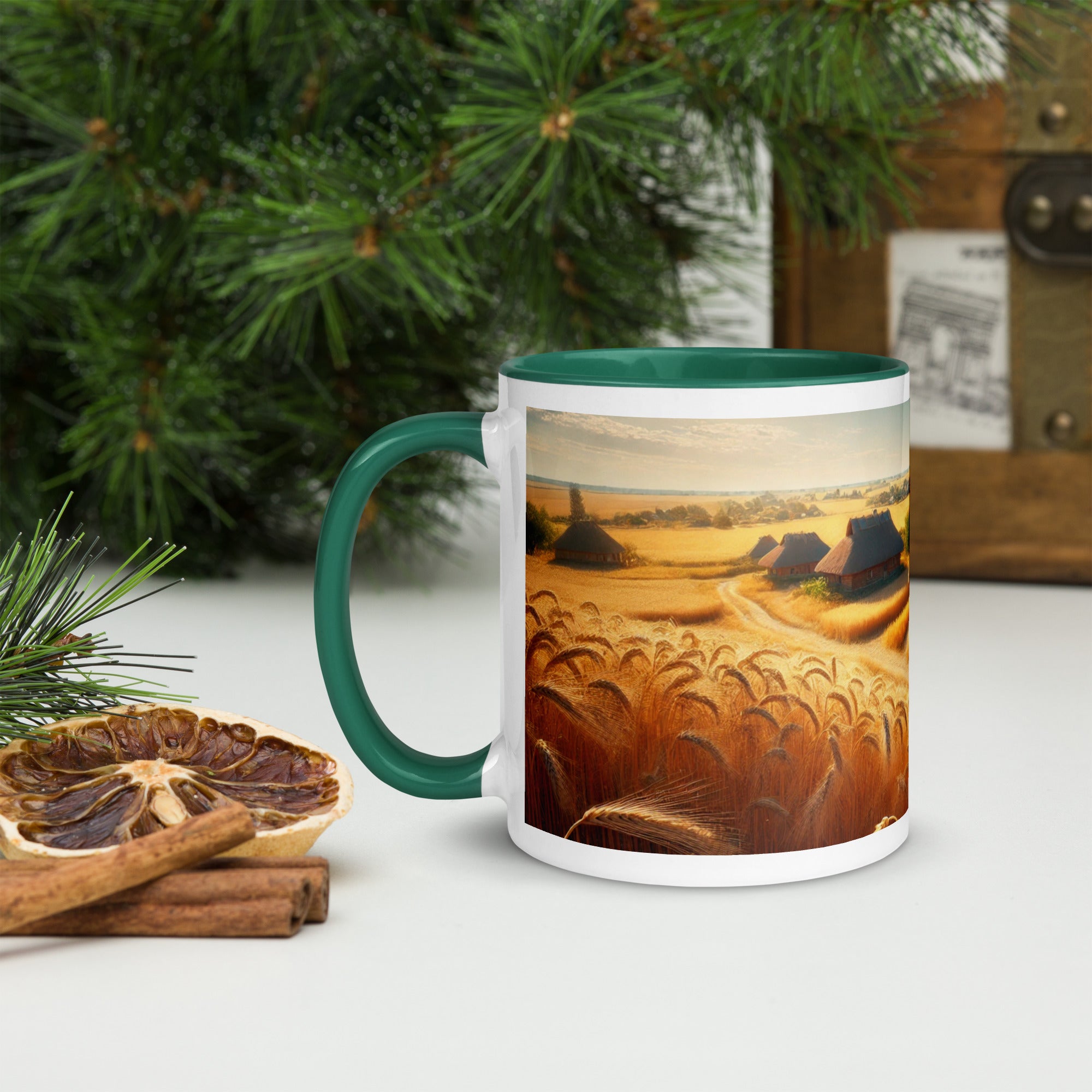 Ceramic mug with green handle featuring a Ukrainian cottage and wheat field design, surrounded by festive decor.