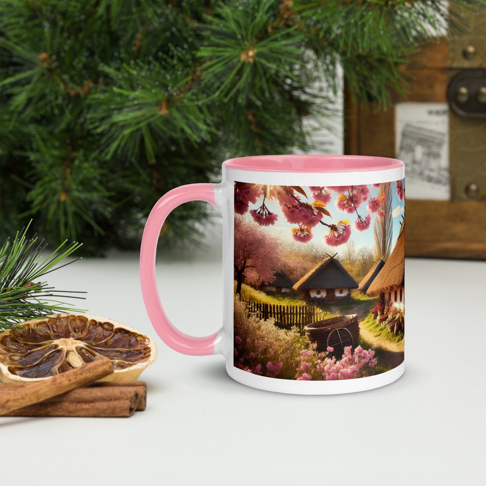 Charming ceramic mug with Ukrainian cottage and cherry orchard design, pink rim and handle, ideal for coffee or tea lovers.