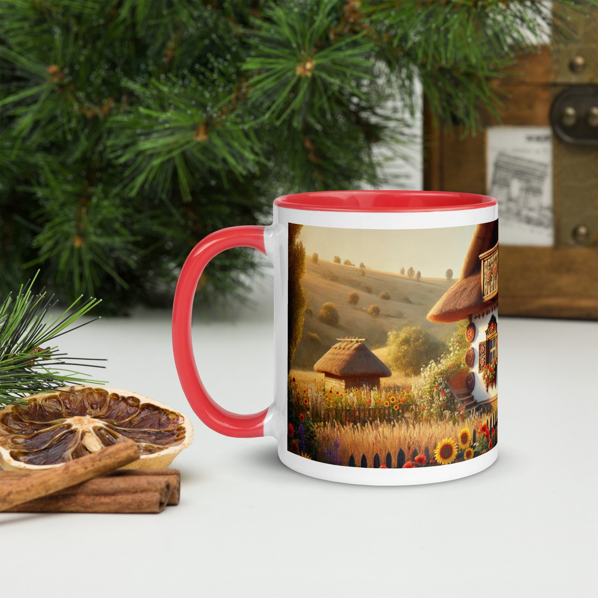 Ceramic mug with Ukrainian cottage and scenic yard design, red rim and handle, surrounded by greenery and dried fruits.