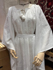 White linen wedding dress with Ukrainian embroidery in boho style, perfect for weddings or as a cultural gift for her.