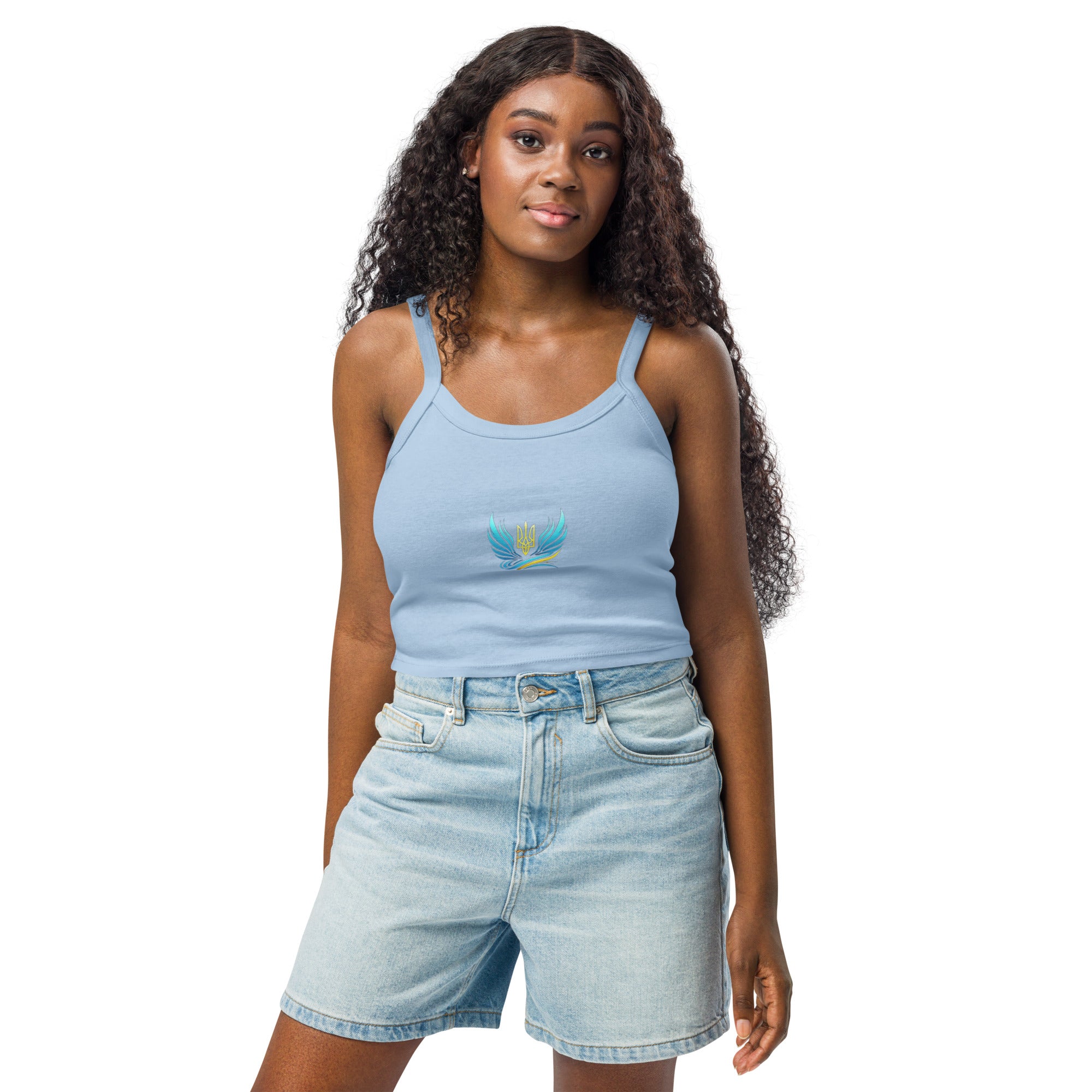 Woman wearing Ukrainian Vibe Trizub Collection micro-rib tank top in light blue, paired with denim shorts.