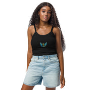 Woman wearing Ukrainian Vibe Trizub Collection micro-rib tank top with Trident design, paired with denim shorts.