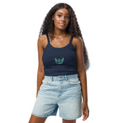 Woman wearing navy micro-rib tank top from Ukrainian Vibe Trizub Collection with embroidered design, paired with denim shorts.