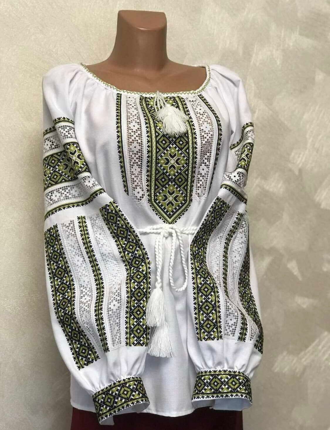 Women's Ukrainian vyshyvanka cotton embroidered shirt with traditional Carpathian motifs and machine cross-stitch embroidery.