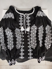Women's Ukrainian Vyshyvanka - Black blouse with white embroidery, traditional folk design, on homespun fabric.