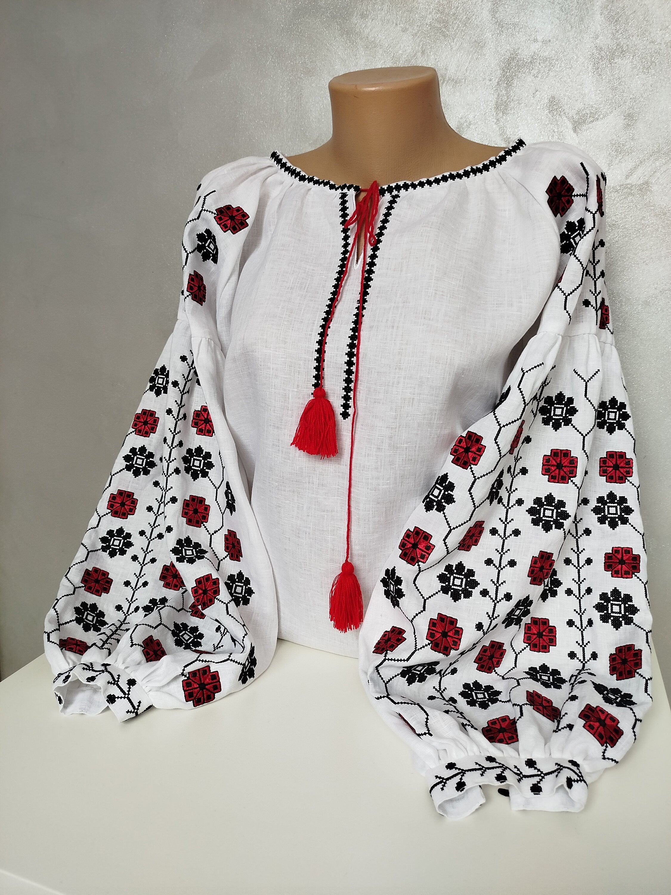 Women's Ukrainian Vyshyvanka, embroidered linen shirt with traditional red and black folk ornaments, custom-made for perfect fit.