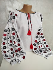 Women's Ukrainian embroidered linen shirt with traditional red and black folk motifs