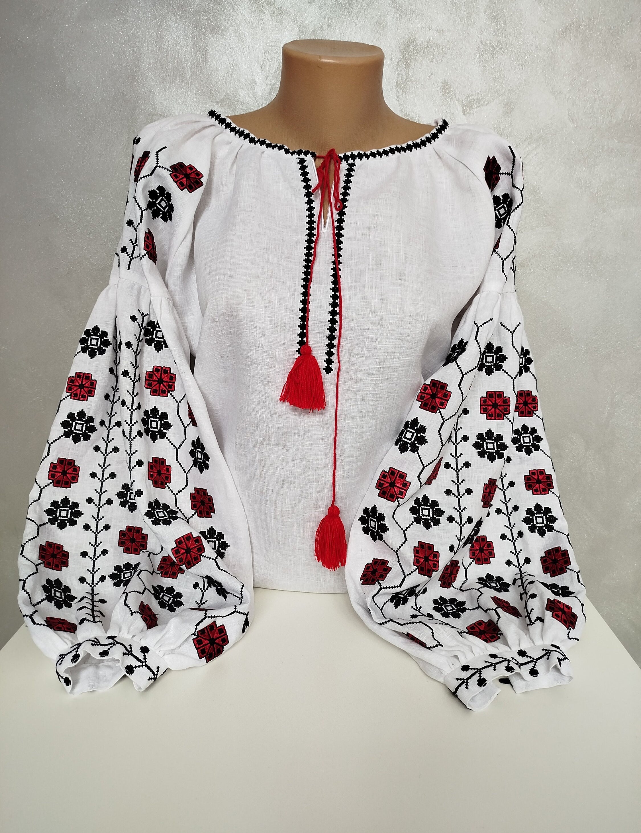 Women's Ukrainian Vyshyvanka - Embroidered linen shirt with red and black traditional motifs.