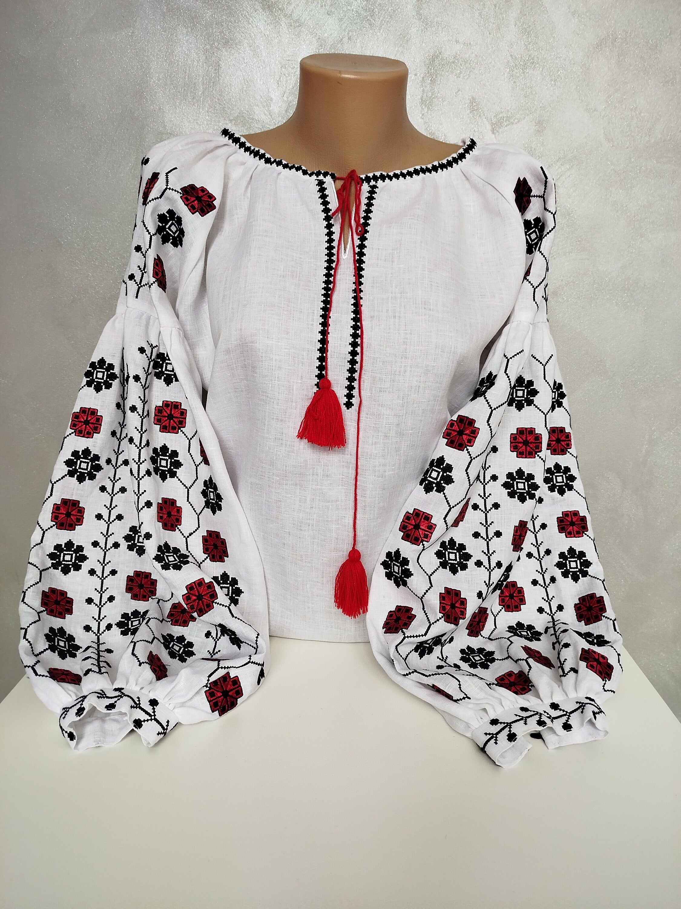Women's Ukrainian Vyshyvanka - Embroidered linen shirt with red and black traditional motifs.