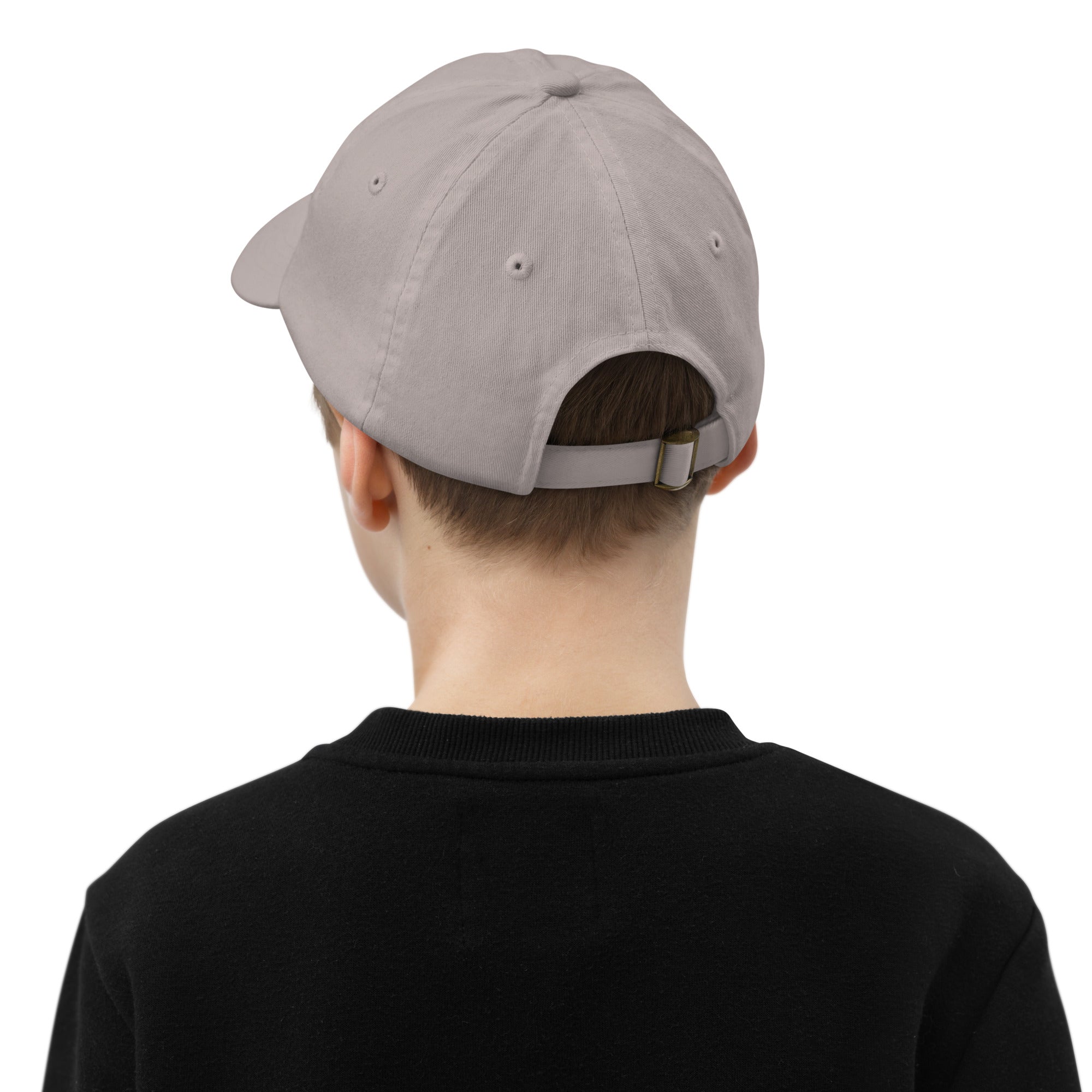 Back view of a youth baseball cap with adjustable strap, worn by a child. Perfect for active kids, featuring breathable eyelets.