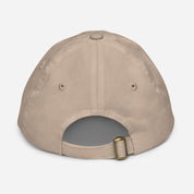 Back view of youth baseball cap with adjustable strap and eyelets for ventilation.